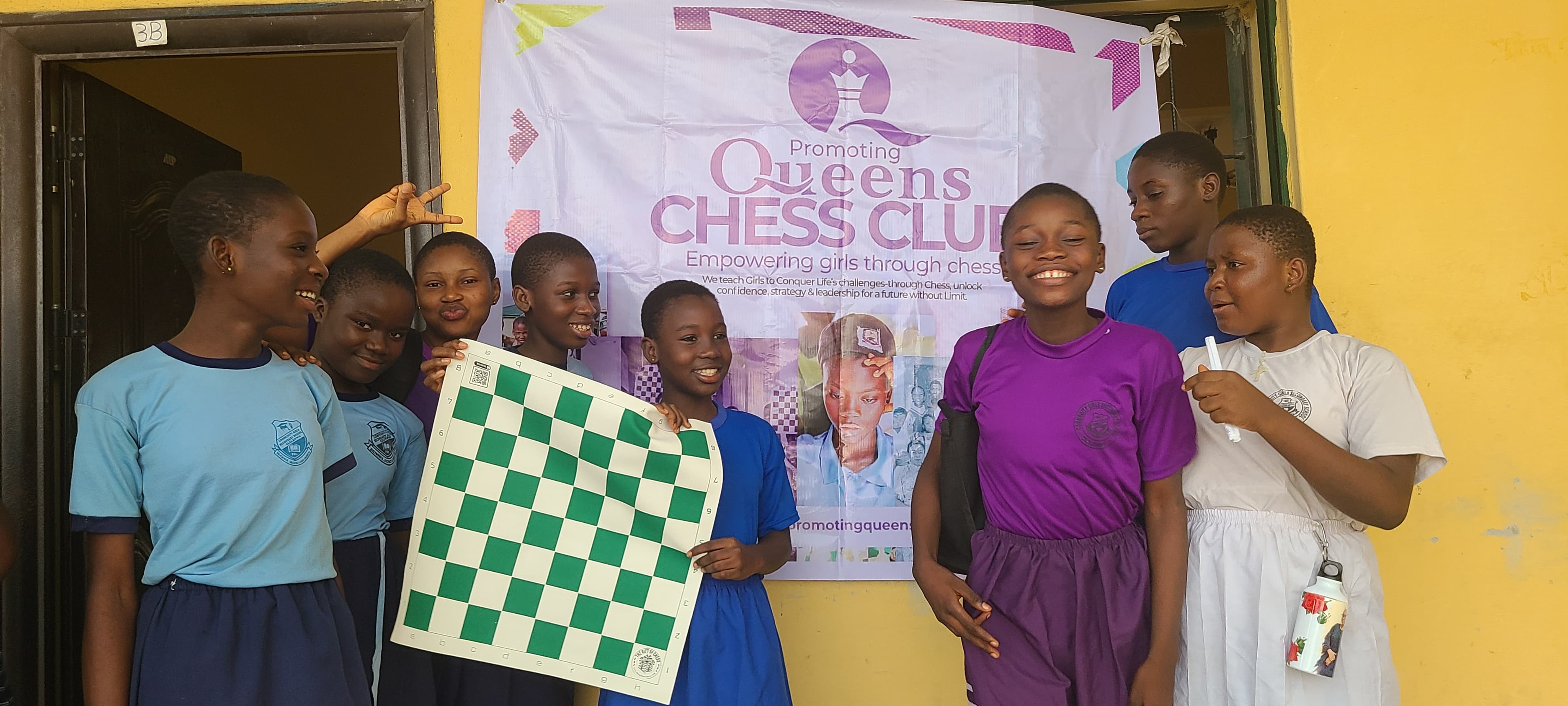 Students practicing chess strategies